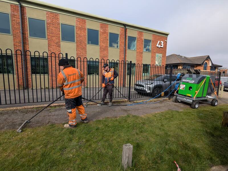 Productive weed management of pavements lined with cars - Cover Image